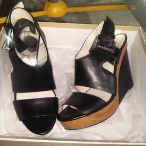 Michael Kors Black with silver in sole dress heel/flats. Size 8 New never worn.